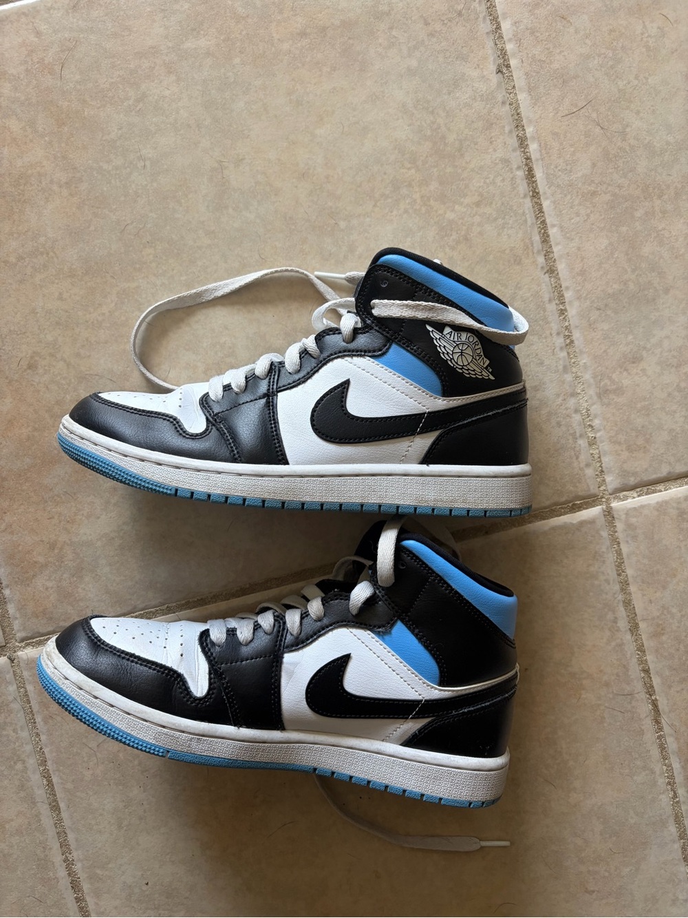 Air Jordan 1 High-Top Black White University Blue Sneakers